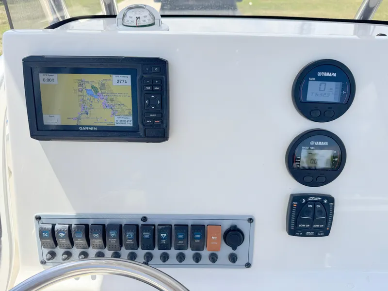 Slide: The Image of Control panel of 2022 Key West 219 FS boat with Garmin GPS and Yamaha gauges. - 20