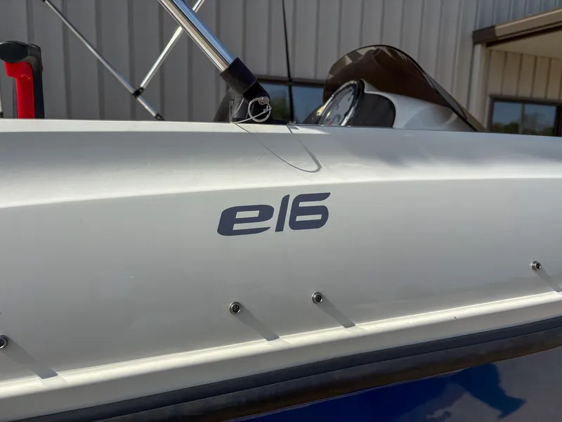 Slide: The Image of 2019 Bayliner Element E16 boat side view with model logo. - 4