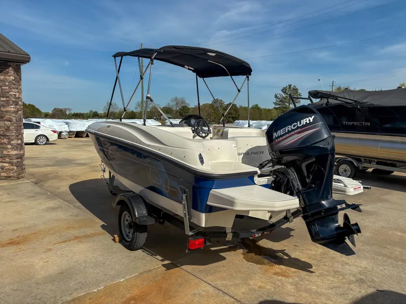 Slide: The Image of 2019 Bayliner Element E16 boat with Mercury outboard motor on a trailer. - 7