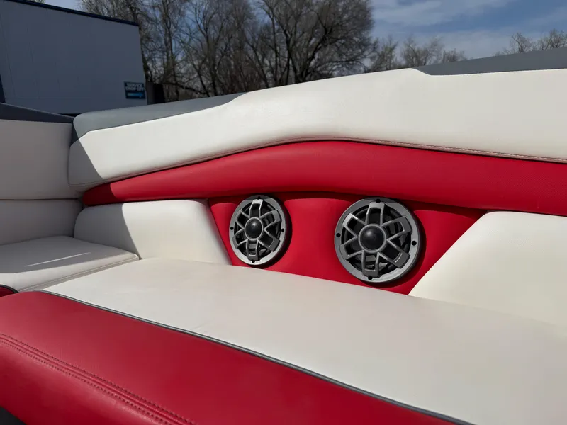 Slide: The Image of Red and white interior of 2020 Axis A24 boat with built-in speakers. - 22