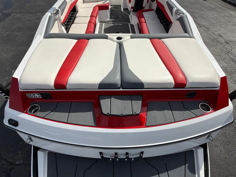 Slide: The Image of 2020 Axis A24 boat with red and gray seating, rear view. - 9