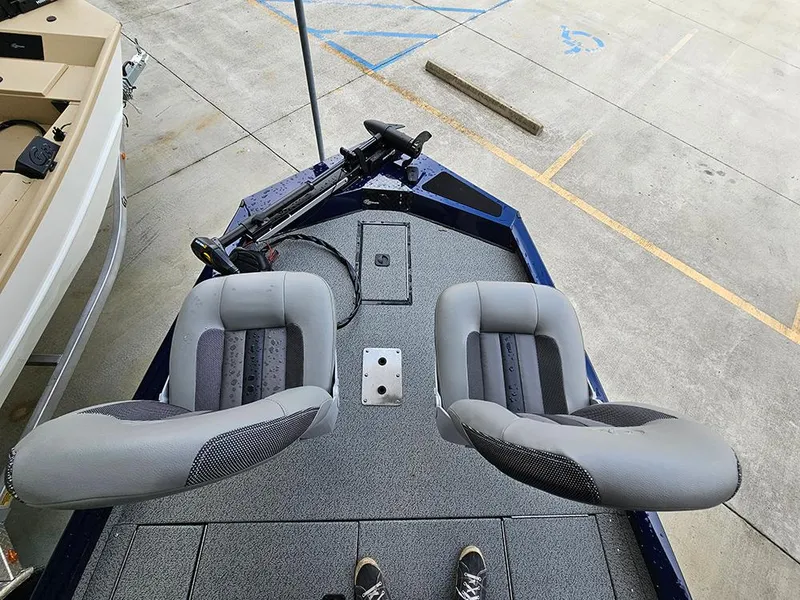 Slide: The Image of 2025 G3 Sportsman 1810 PFX boat with dual seats and trolling motor on deck. - 13