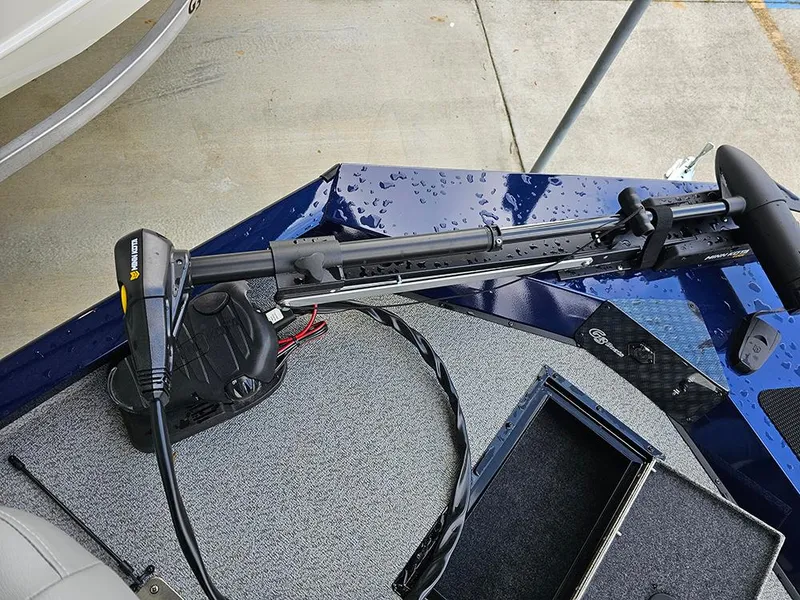 Slide: The Image of 2025 G3 Sportsman 1810 PFX boat deck with trolling motor and storage compartments. - 16