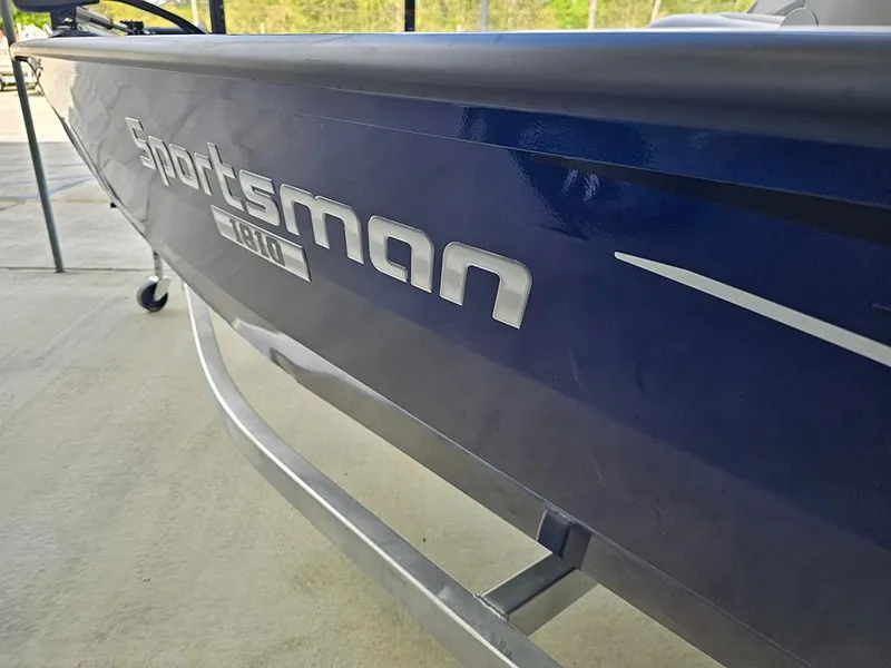 Slide: The Image of 2025 G3 Sportsman 1810 PFX boat, blue exterior, close-up view. - 20