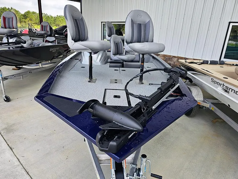 Slide: The Image of 2025 G3 Sportsman 1810 PFX fishing boat with gray seats and trolling motor. - 3