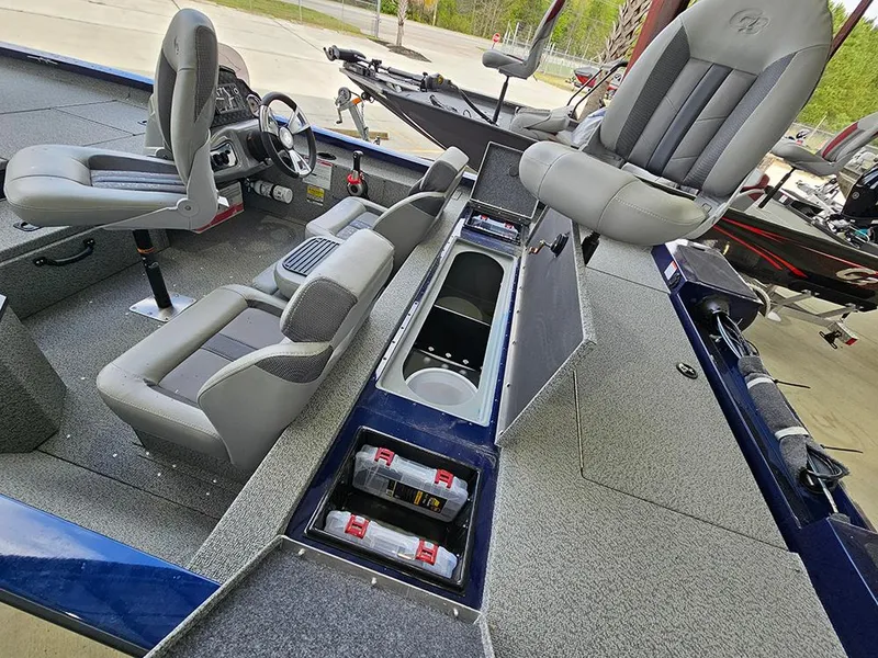 Slide: The Image of 2025 G3 Sportsman 1810 PFX boat interior with seating and storage compartments. - 7