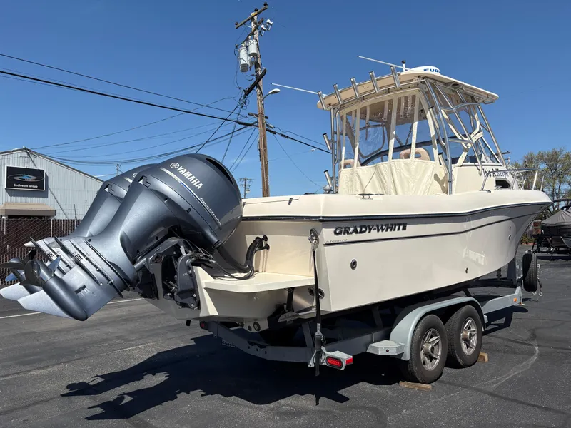 Slide: The Image of 2021 Grady-White 232 Gulfstream boat on trailer with Yamaha outboard motor. - 4