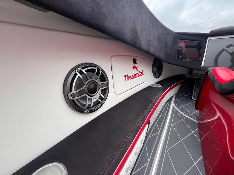 Slide: The Image of Interior of 2020 Wright Performance 360 boat with speakers and Timber Cat logo. - 13