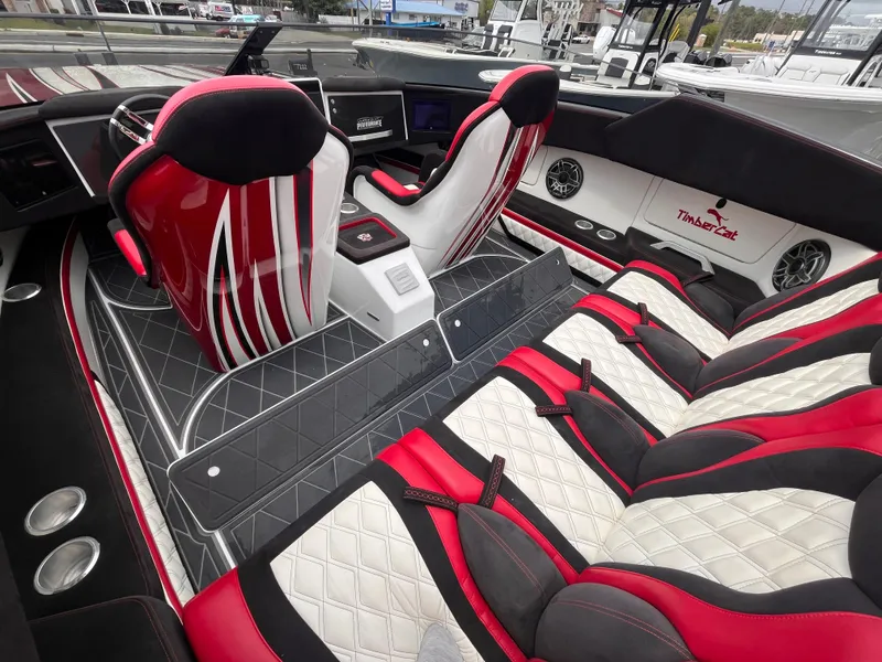 Slide: The Image of Luxurious interior of 2020 Wright Performance 360 boat with red and white seating. - 14