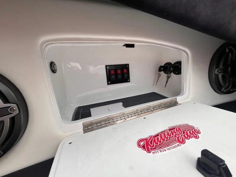 Slide: The Image of 2020 Wright Performance 360 boat interior with control panel and speaker system. - 15