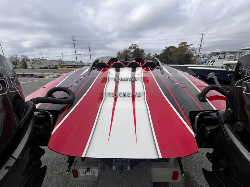 Slide: The Image of 2020 Wright Performance 360 boat with red and white design, rear view. - 7