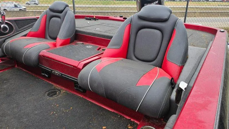 Slide: The Image of 2017 Ranger Z518 boat interior with red and black seats, showcasing sleek design. - 2
