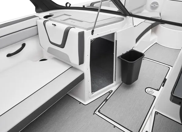 Slide: The Image of 2025 Yamaha Boats AR220 interior, featuring sleek seating and storage compartment. - 4