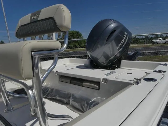 Slide: The Image of 2025 Key West 188 BR boat with Yamaha outboard motor, featuring sleek seating and modern design. - 14
