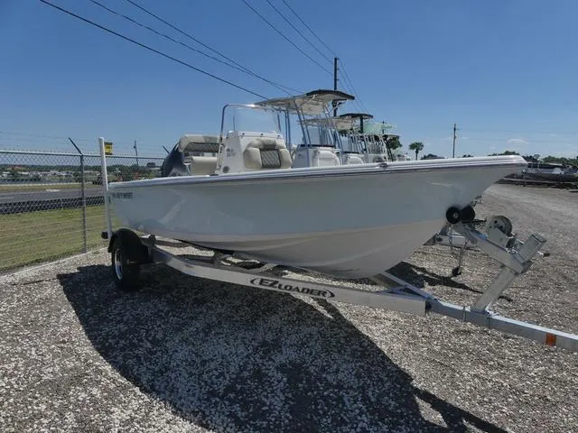 Slide: The Image of 2025 Key West 188 BR boat on trailer in outdoor setting. - 3