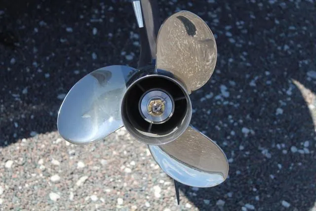 Slide: The Image of Propeller of 2025 Key West 188 BR boat on gravel surface. - 10