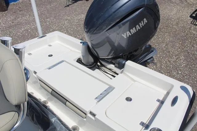 Slide: The Image of 2025 Key West 188 BR boat with Yamaha outboard motor, featuring a spacious deck layout. - 15