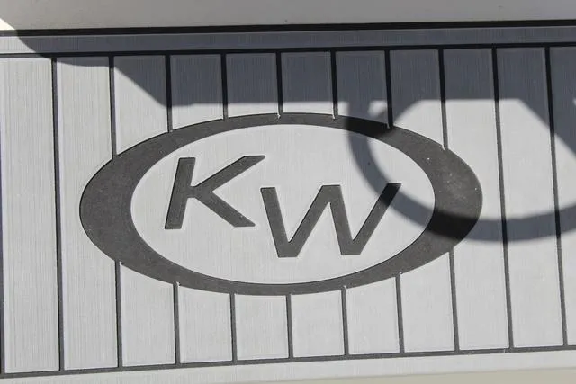 Slide: The Image of Key West 188 BR 2025 logo on boat deck, featuring 'KW' in oval design. - 16