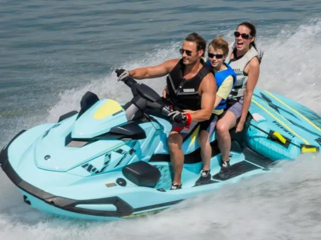 Slide: The Image of 2025 Yamaha Waverunner VX Limited HO with three riders enjoying a thrilling water adventure. - 10