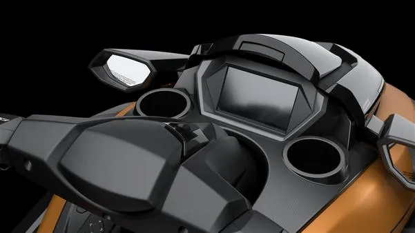 Slide: The Image of 2025 Yamaha Waverunner FX Cruiser HO dashboard with audio system, sleek design, black and orange finish. - 6