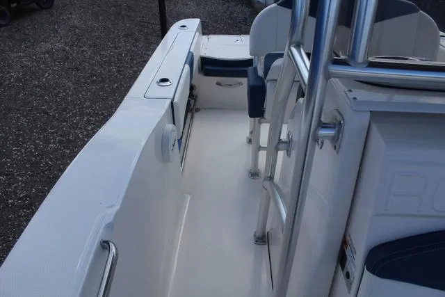 Slide: The Image of 2022 Robalo R200 boat interior with seating and railing, showcasing sleek design and functionality. - 19