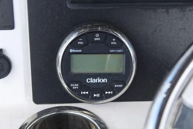 Slide: The Image of Clarion GR10BT audio system on 2022 Robalo R200 boat dashboard. - 23