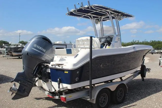 Slide: The Image of 2022 Robalo R200 boat with Yamaha engine on trailer, parked outdoors. - 4