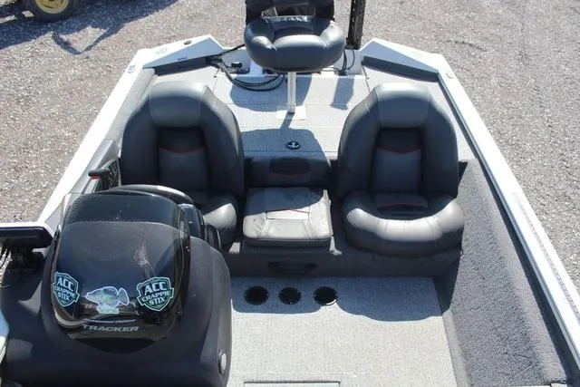 Slide: The Image of 2021 Tracker Pro Team 175 TXW Tournament Edition boat interior with seating and console. - 12