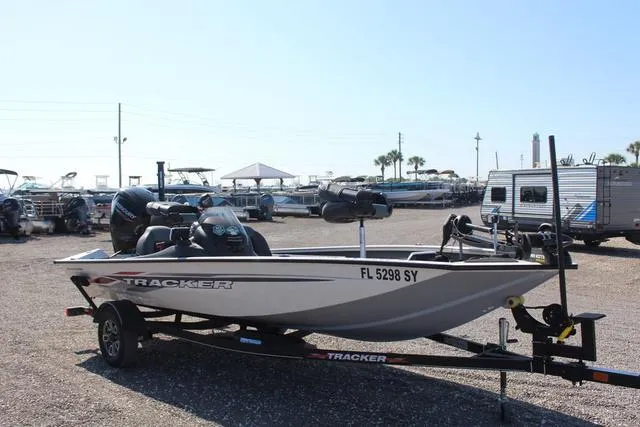 Slide: The Image of 2021 Tracker Pro Team 175 TXW® Tournament Edition boat on trailer in outdoor lot. - 3