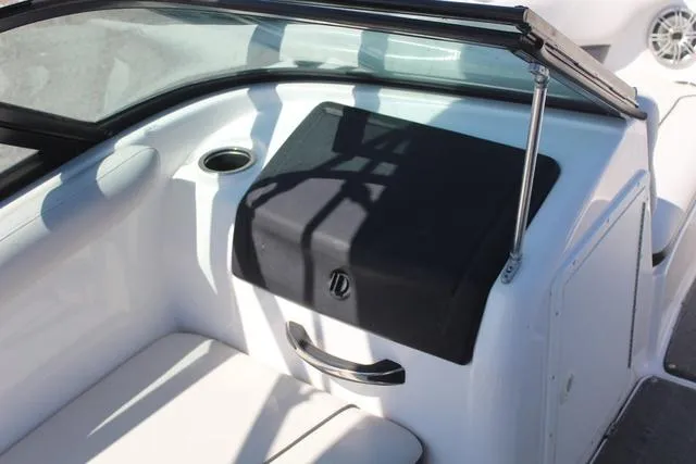 Slide: The Image of 2014 Yamaha Boats AR192 interior with seating and storage compartment. - 11