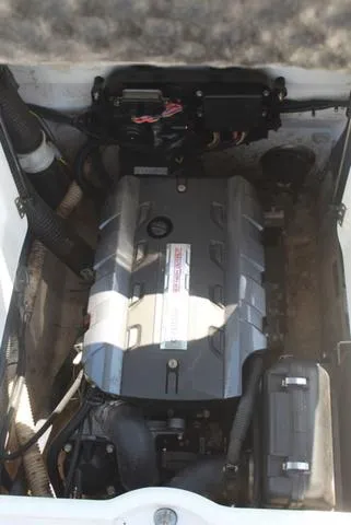 Slide: The Image of 2014 Yamaha Boats AR192 engine compartment, showcasing the engine and components. - 12