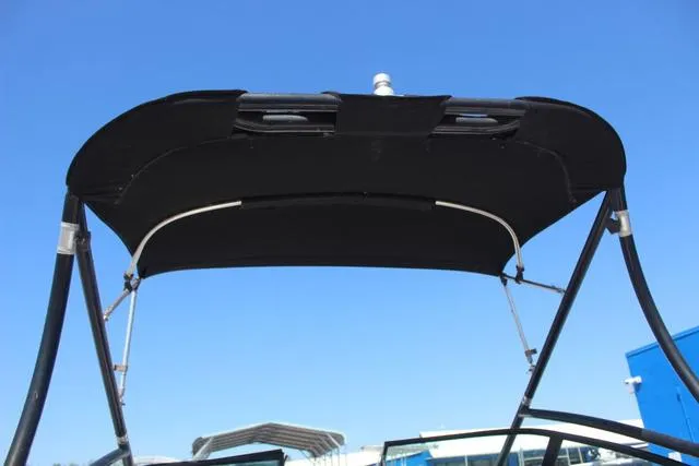 Slide: The Image of 2014 Yamaha AR192 boat canopy against clear blue sky. - 14