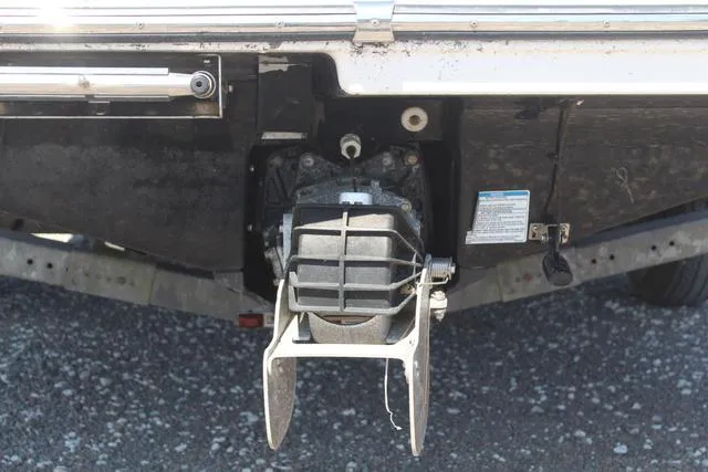 Slide: The Image of 2014 Yamaha Boats AR192 jet drive system close-up on gravel surface. - 7