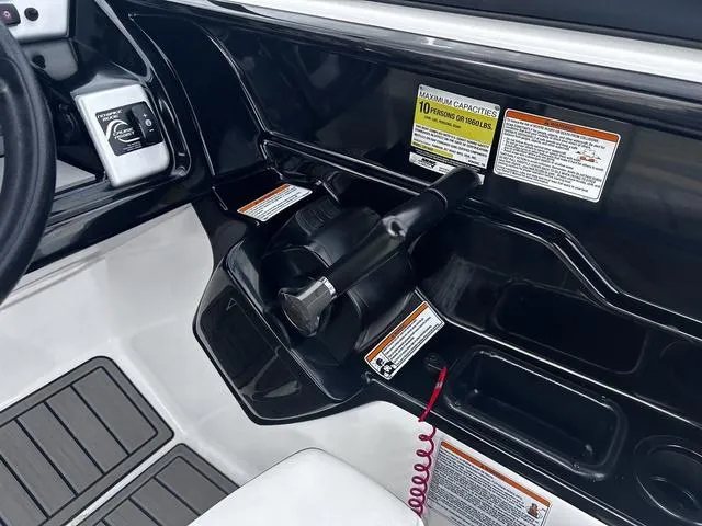 Slide: The Image of 2020 Yamaha AR210 boat dashboard with controls and safety warnings. - 12