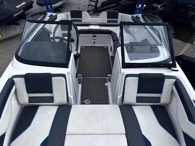 Slide: The Image of 2020 Yamaha Boats AR210 interior with sleek seating and modern design. - 17