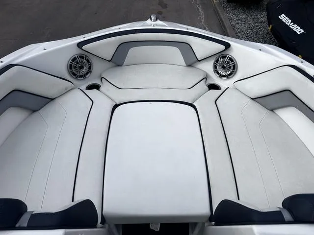 Slide: The Image of 2015 Yamaha AR192 boat interior with cushioned seating and built-in speakers. - 12