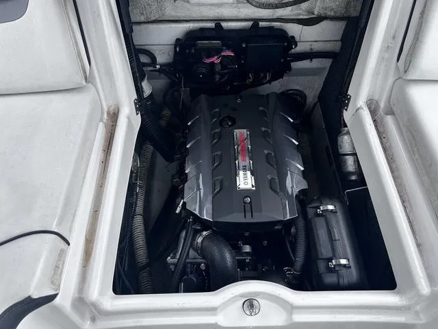 Slide: The Image of Engine compartment of a 2015 Yamaha Boats AR192, showcasing the engine and components. - 17
