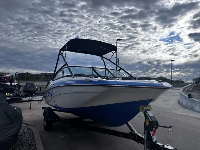 Slide: The Image of 2015 Yamaha AR192 boat on trailer under cloudy sky. - 5