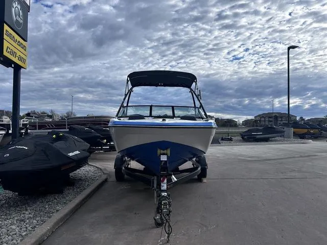 Slide: The Image of 2015 Yamaha AR192 boat on trailer under cloudy sky. - 6