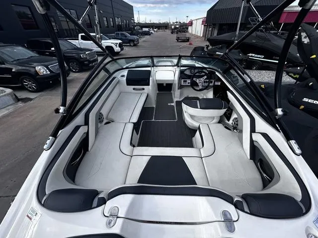 Slide: The Image of 2015 Yamaha Boats AR192 interior with sleek seating and modern dashboard design. - 9