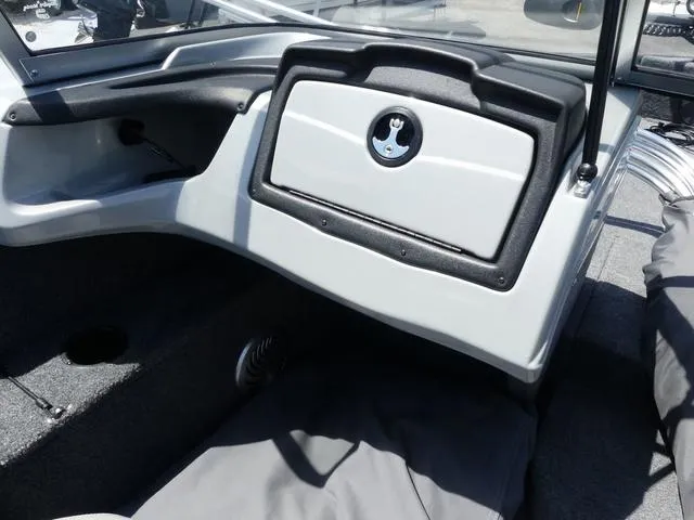 Slide: The Image of 2019 Tracker Pro Guide V-165 WT boat interior with storage compartment and seating. - 11