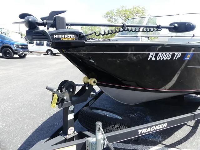 Slide: The Image of 2019 Tracker Pro Guide V-165 WT boat on trailer with Minn Kota PowerDrive motor. - 3