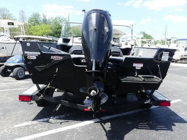 Slide: The Image of 2019 Tracker Pro Guide V-165 WT boat, rear view, parked on trailer. - 5