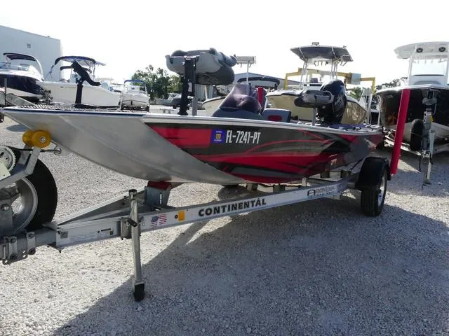 Slide: The Image of 2014 Tracker Pro 170 boat on Continental trailer, parked in a marina lot. - 3