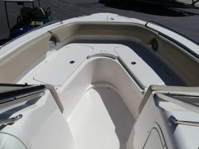 Slide: The Image of 2015 Pursuit Boats DC 235 interior, featuring spacious seating and sleek design. - 14