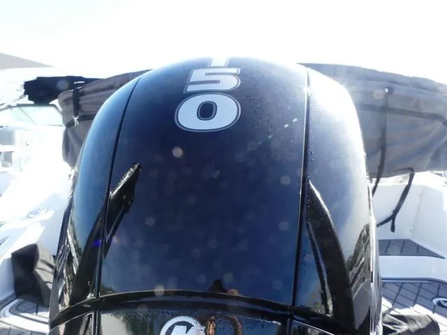 Slide: The Image of 2022 Tahoe 2150 boat engine with "150" marking, close-up view. - 6