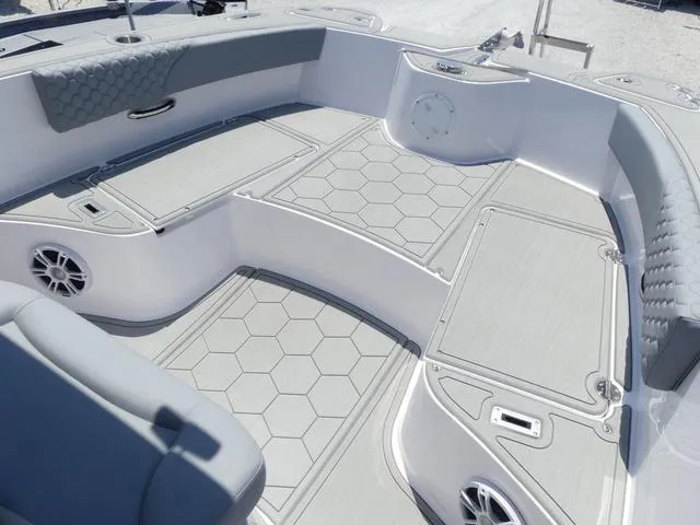 Slide: The Image of 2025 Twin Vee 240 Center Console STX boat seat with sleek gray upholstery. - 13