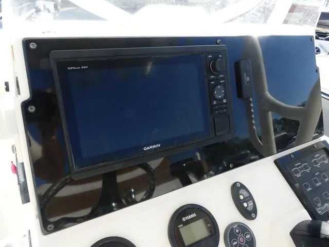 Slide: The Image of Control panel of 2019 Skeeter SX2250 boat with Garmin GPS and Yamaha gauges. - 14
