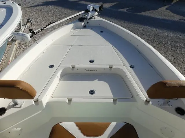 Slide: The Image of 2019 Skeeter SX2250 boat deck with storage compartments and seating. - 16