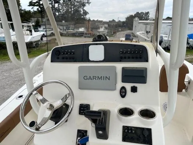 Slide: The Image of 2023 Pioneer 220 Bay Sport boat dashboard with Garmin navigation system. - 5